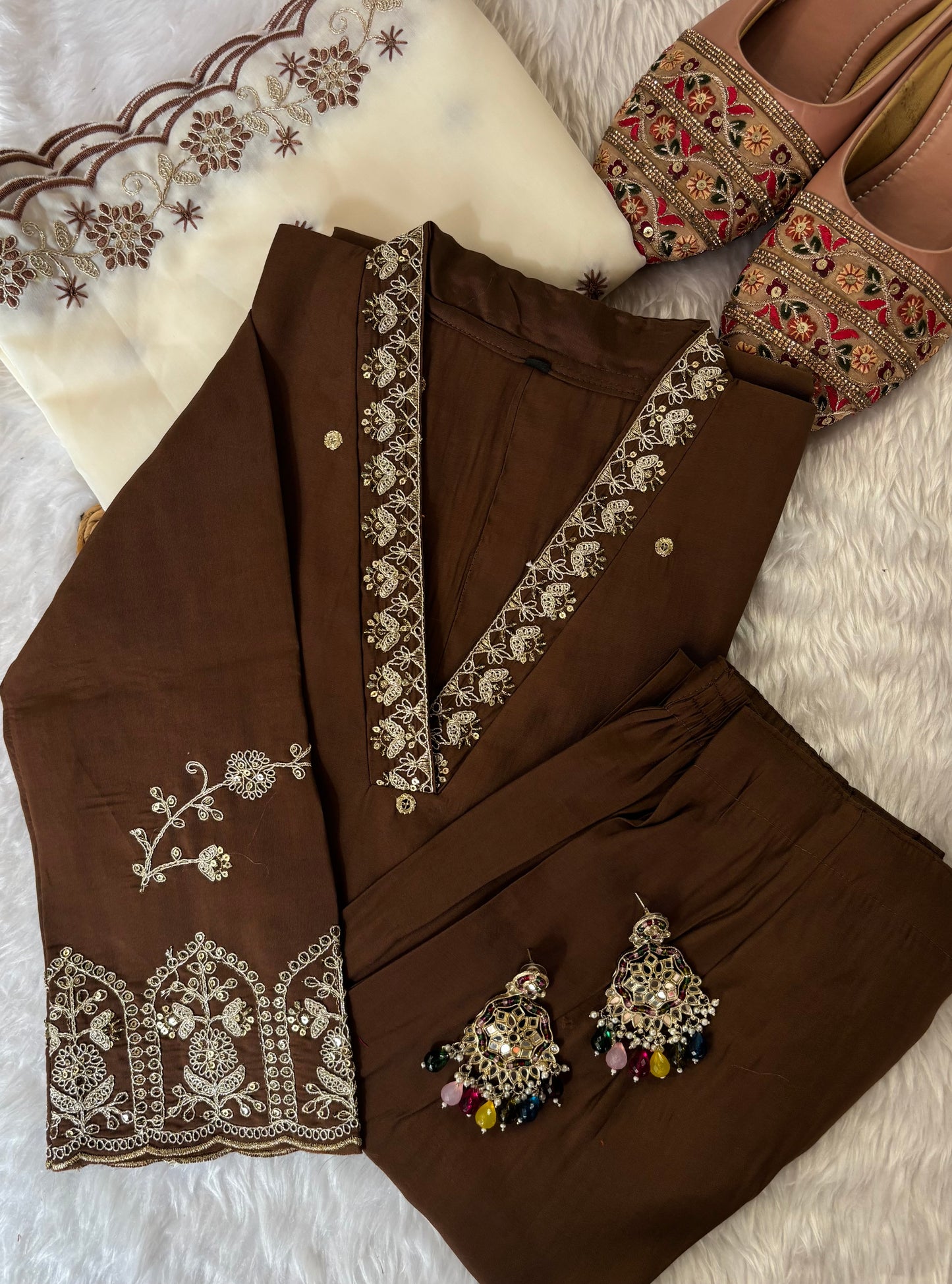 MD-213 "Elegance in every detail with embroidary work ✨ This deep purple suit with delicate floral embroidery is a perfect blend of grace and tradition