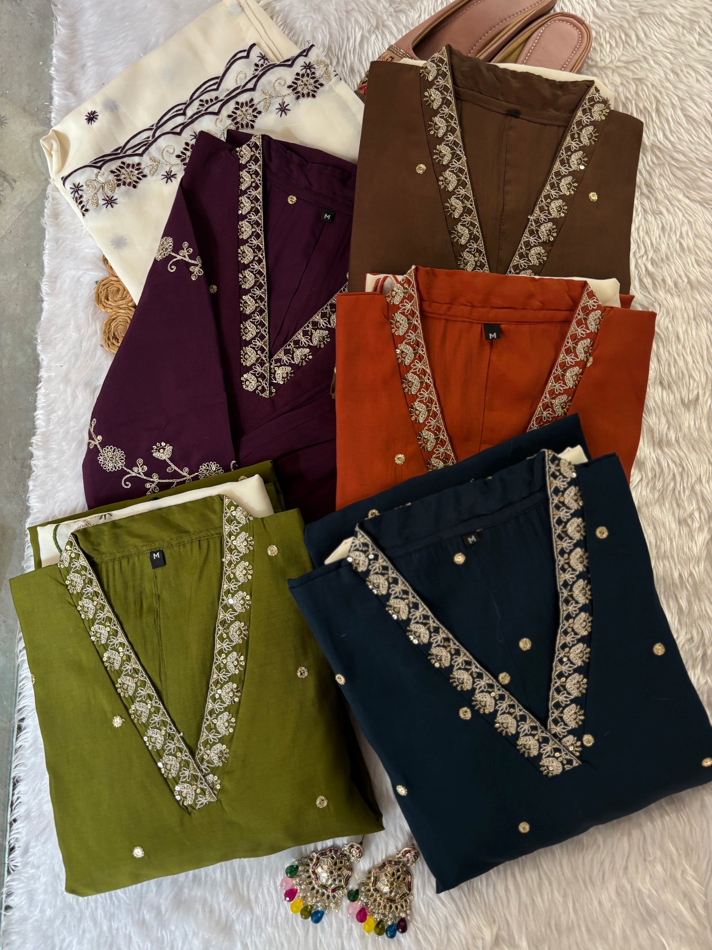 MD-213 "Elegance in every detail with embroidary work ✨ This deep purple suit with delicate floral embroidery is a perfect blend of grace and tradition