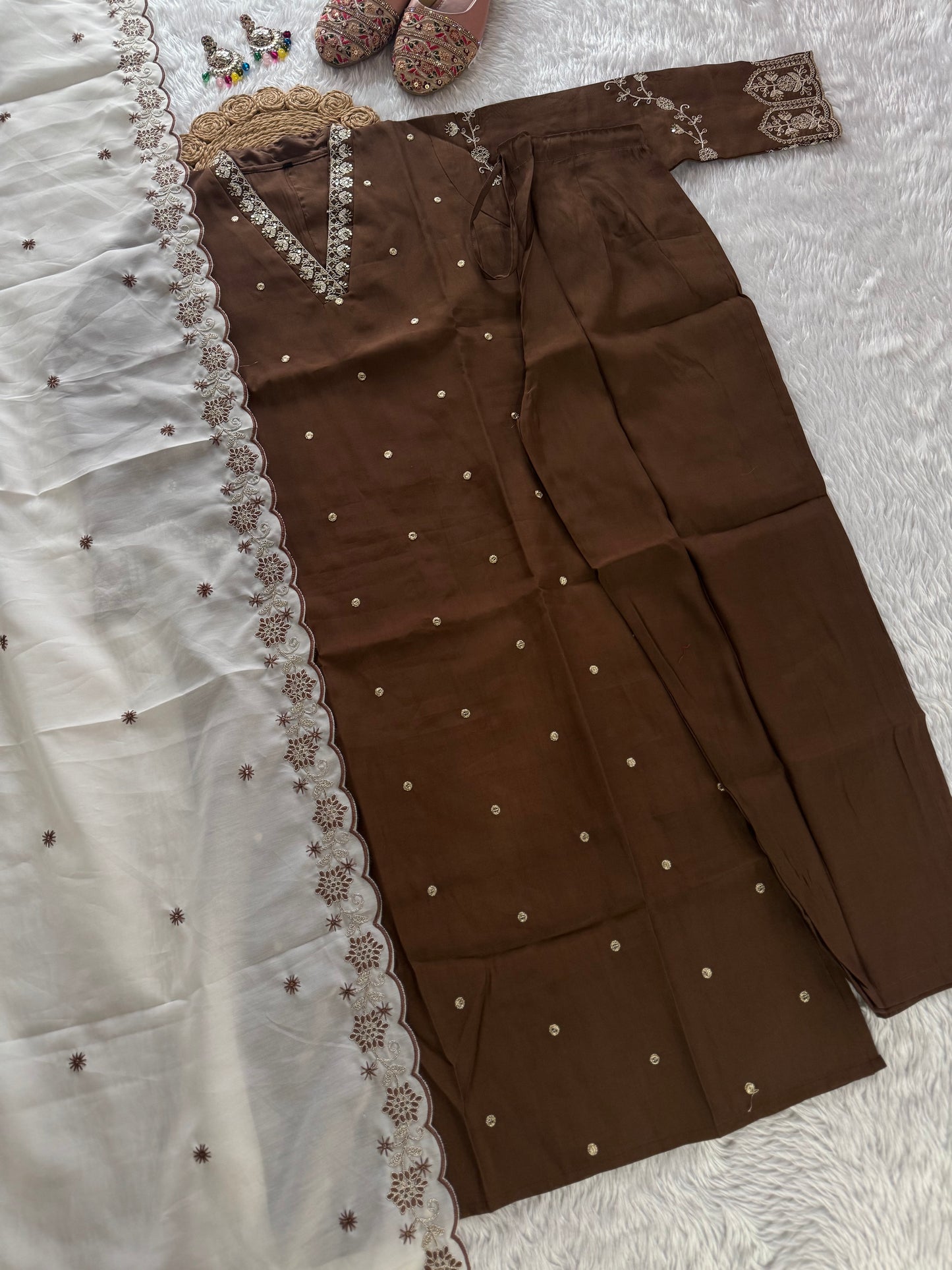 MD-213 "Elegance in every detail with embroidary work ✨ This deep purple suit with delicate floral embroidery is a perfect blend of grace and tradition