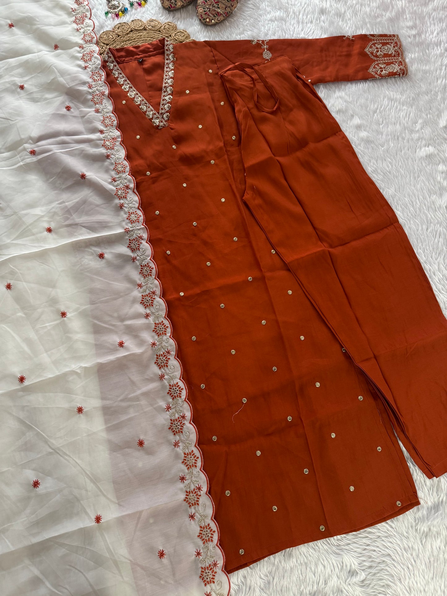 MD-213 "Elegance in every detail with embroidary work ✨ This deep purple suit with delicate floral embroidery is a perfect blend of grace and tradition