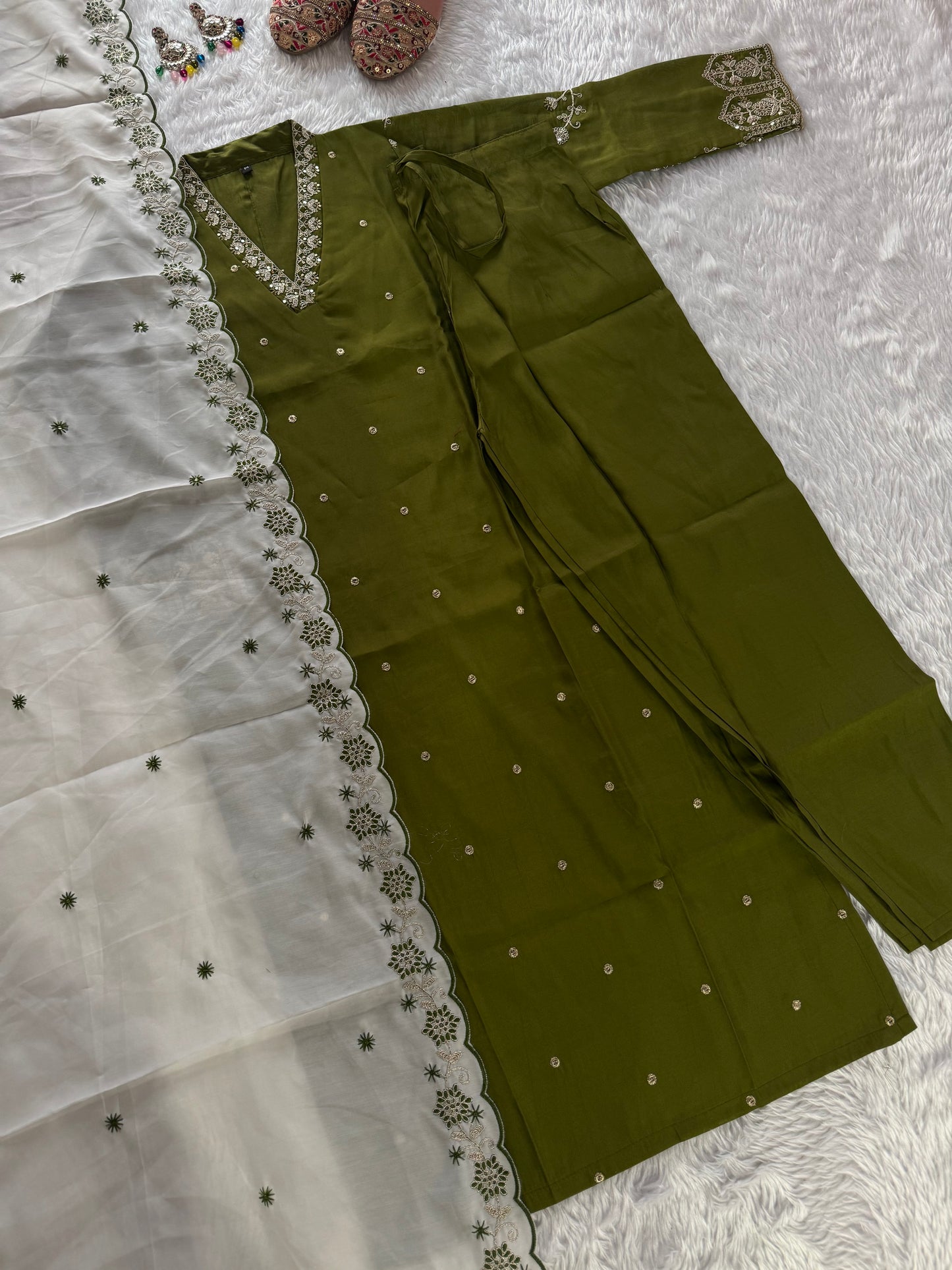 MD-213 "Elegance in every detail with embroidary work ✨ This deep purple suit with delicate floral embroidery is a perfect blend of grace and tradition