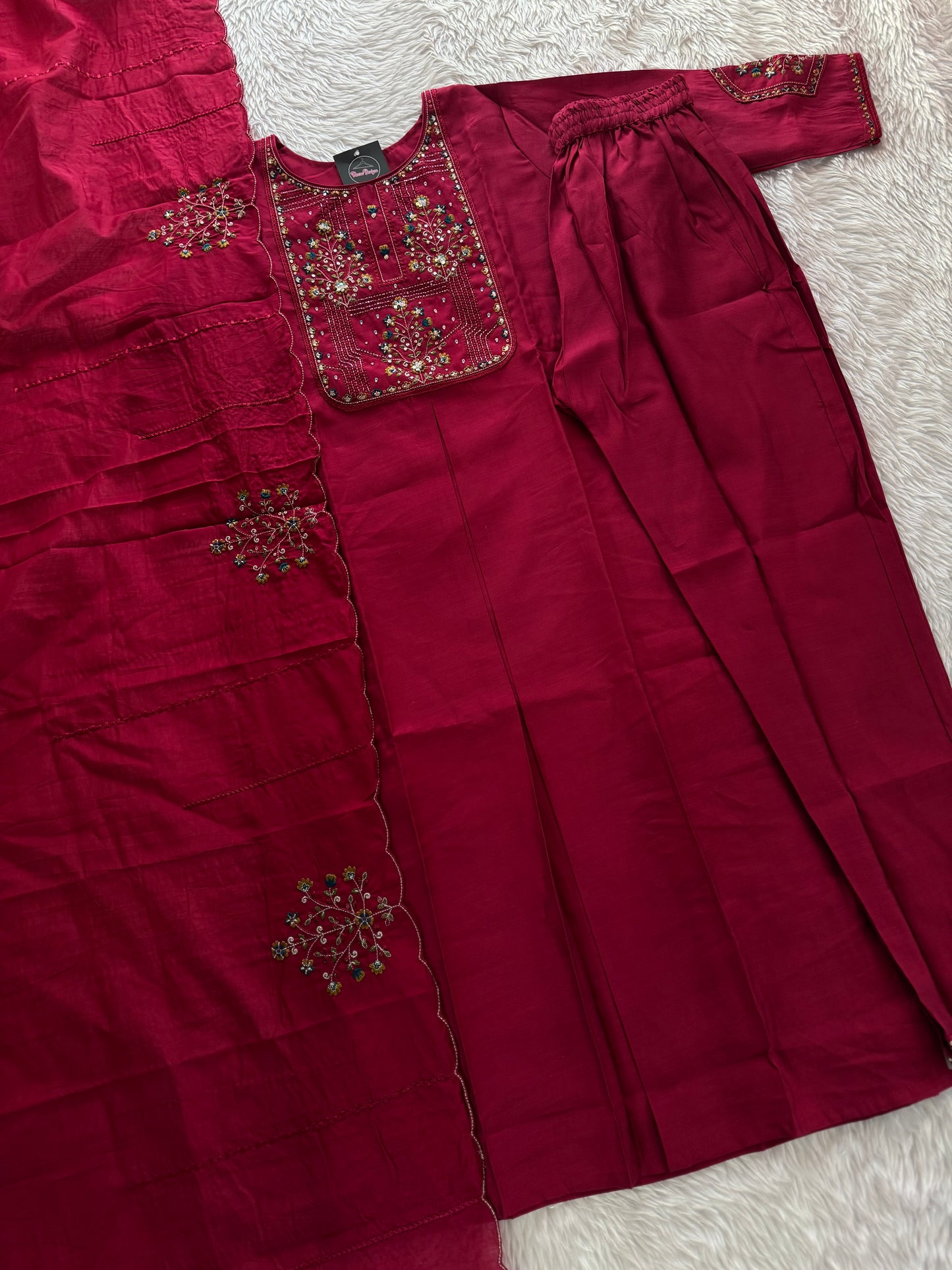 MD-211 hend work new designs in 3 piece MD-209 "Elegance in every detail ✨ This deep purple suit with delicate floral embroidery is a perfect blend of grace and tradition 🌸💜