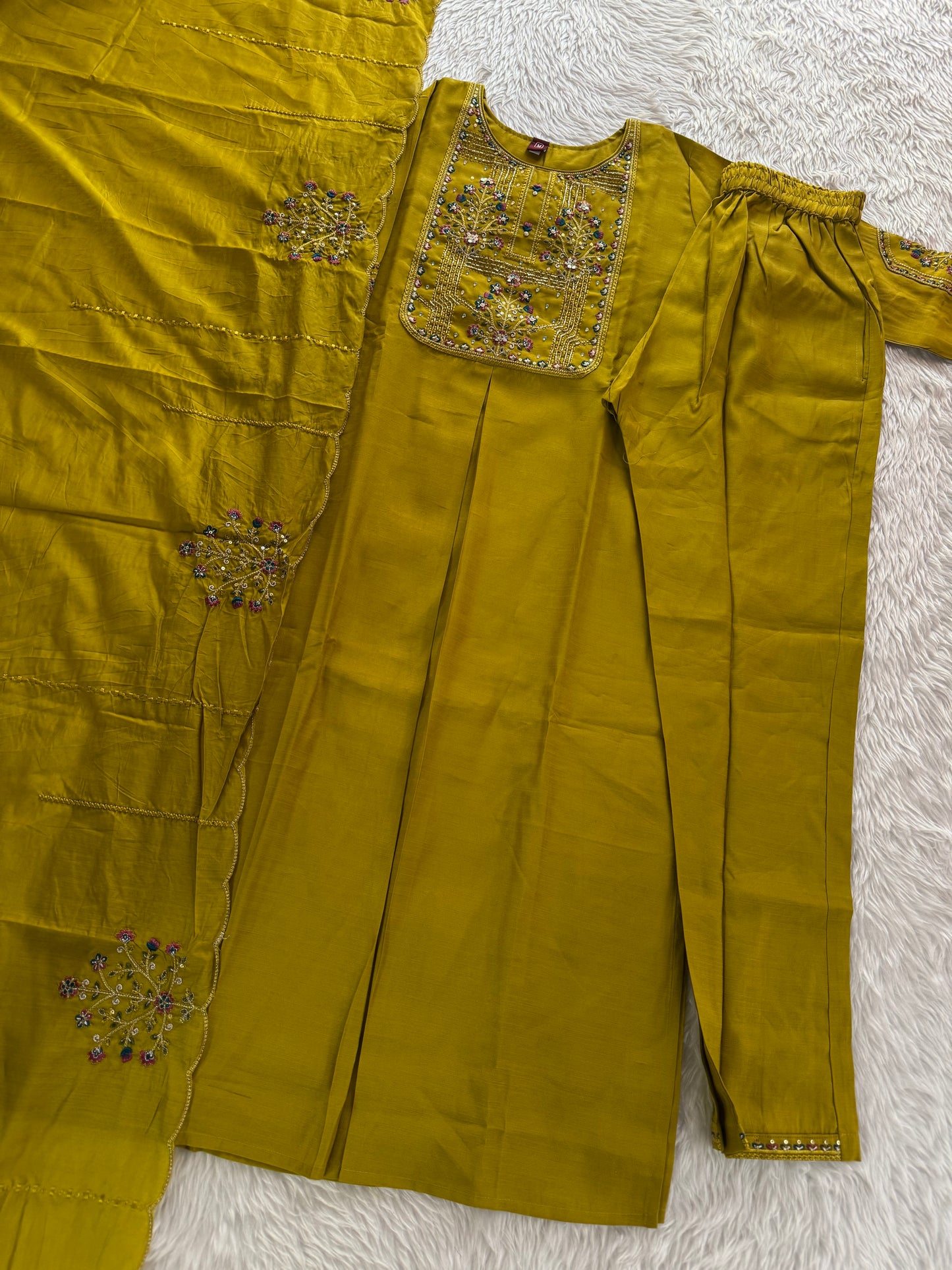 MD-211 hend work new designs in 3 piece MD-209 "Elegance in every detail ✨ This deep purple suit with delicate floral embroidery is a perfect blend of grace and tradition 🌸💜