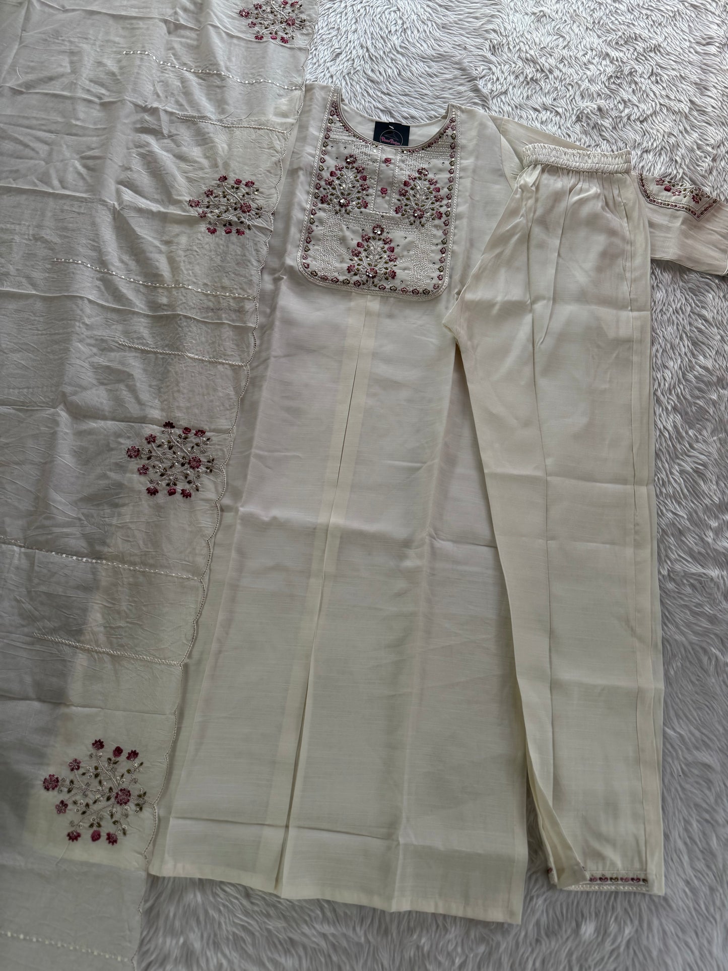 MD-211 hend work new designs in 3 piece MD-209 "Elegance in every detail ✨ This deep purple suit with delicate floral embroidery is a perfect blend of grace and tradition 🌸💜