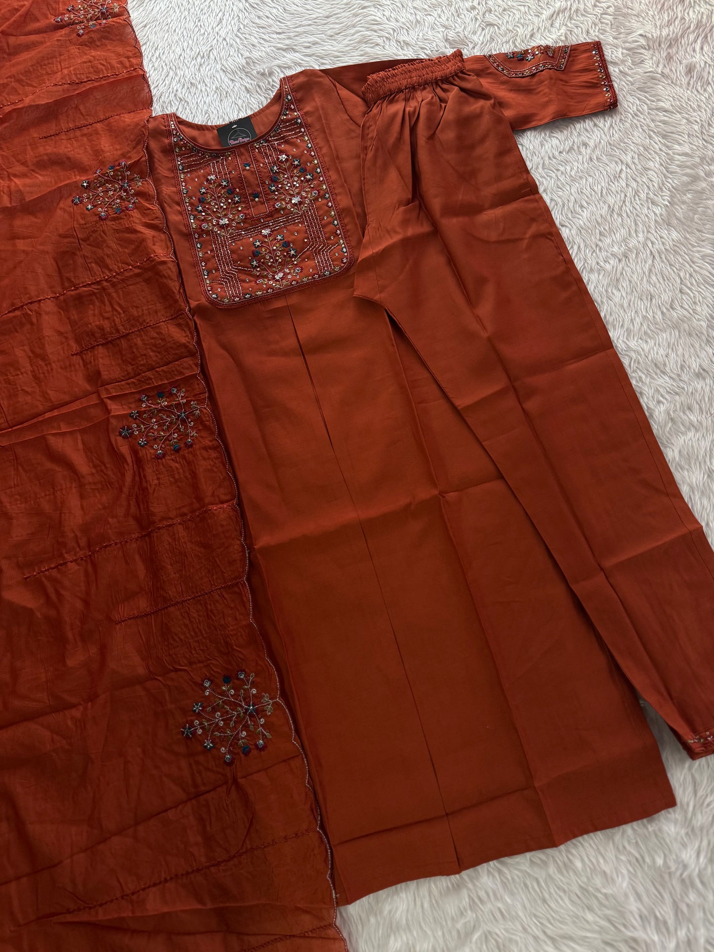 MD-211 hend work new designs in 3 piece MD-209 "Elegance in every detail ✨ This deep purple suit with delicate floral embroidery is a perfect blend of grace and tradition 🌸💜