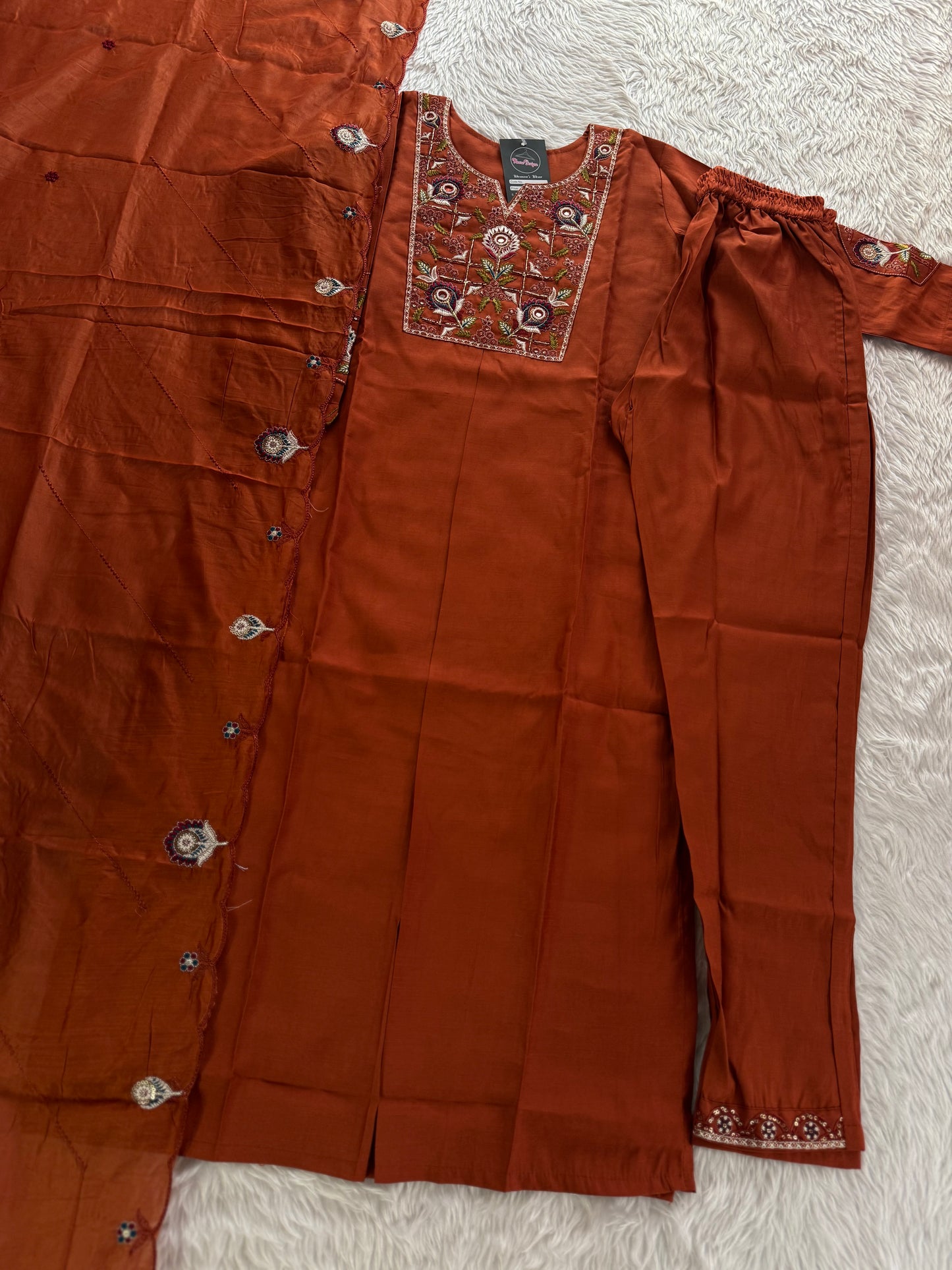 MD-212 "Elegance in every detail ✨ This deep purple suit with delicate floral embroidery is a perfect blend of grace and tradition