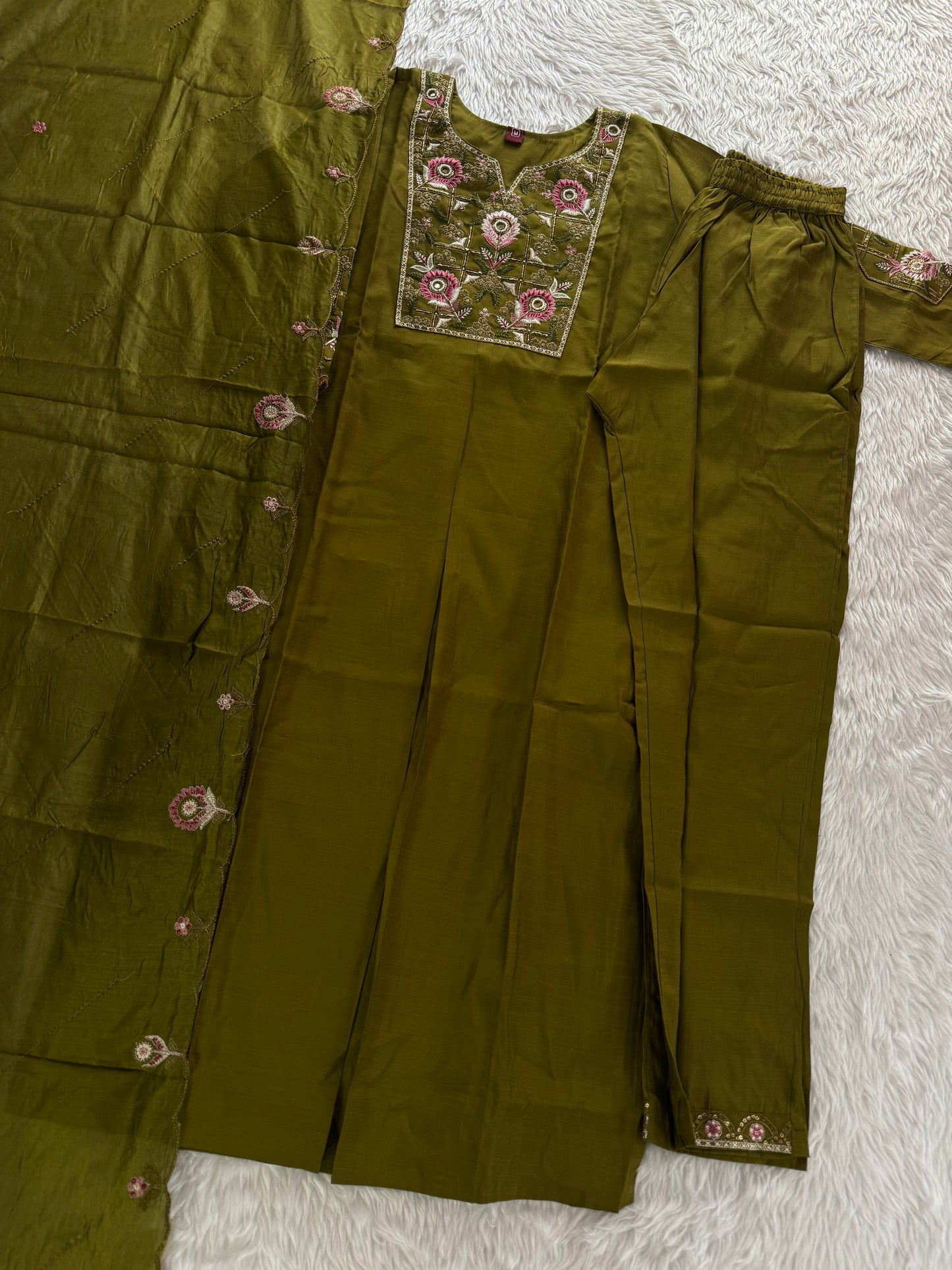 MD-212 "Elegance in every detail ✨ This deep purple suit with delicate floral embroidery is a perfect blend of grace and tradition