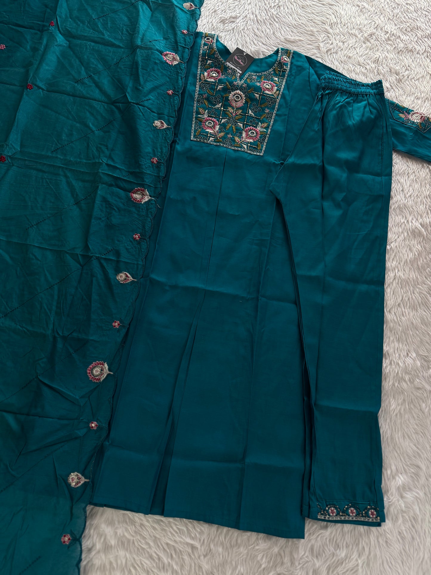 MD-212 "Elegance in every detail ✨ This deep purple suit with delicate floral embroidery is a perfect blend of grace and tradition