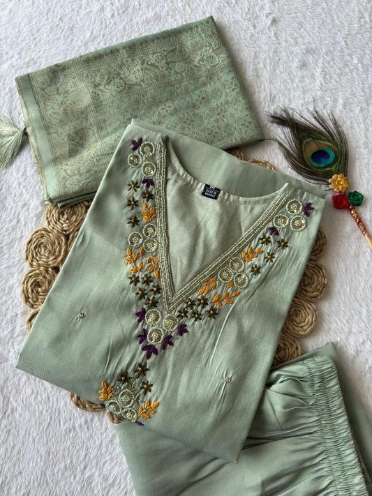MD-239This sage green ensemble has a lovely, calming aesthetic. The V-neck embroidery and the peacock feather accent suggest a perfect blend of traditional craft and modern elegance.💜💥💫