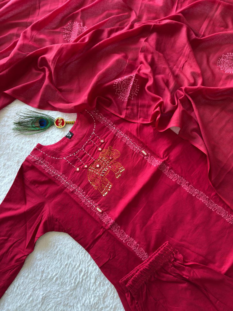 MD-237 Choosing the right title depends on the vibe of your brand, but since this piece features traditional elephant embroidery and a rich crimson hue, you can play with themes of heritage, royalty, and grace❤️💥💫