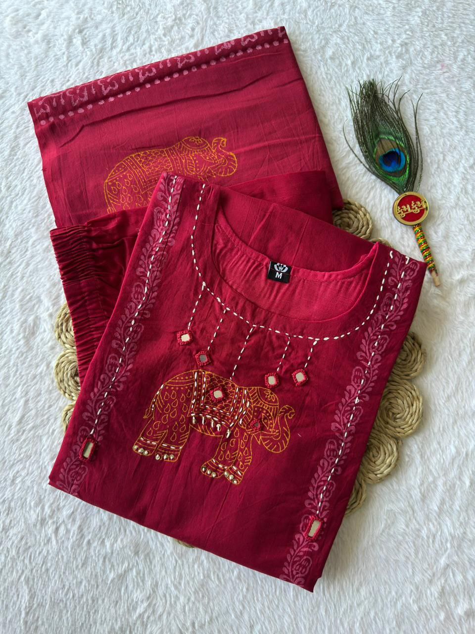 MD-237 Choosing the right title depends on the vibe of your brand, but since this piece features traditional elephant embroidery and a rich crimson hue, you can play with themes of heritage, royalty, and grace❤️💥💫