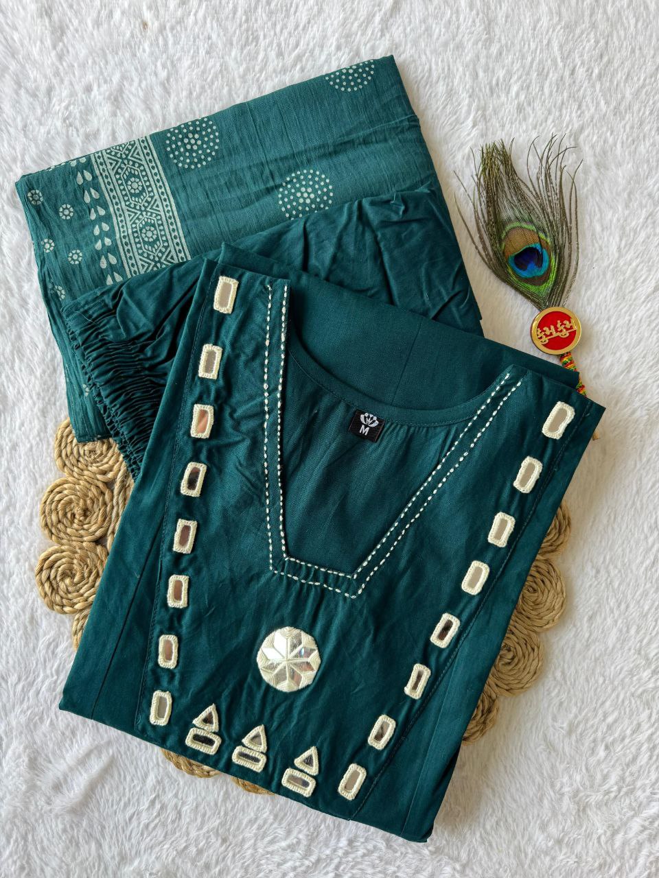 MD-230 This deep teal cotton set has a fantastic geometric vibe with those mirror-work patches and contrast stitching. It feels both regal and grounded💥🙈
